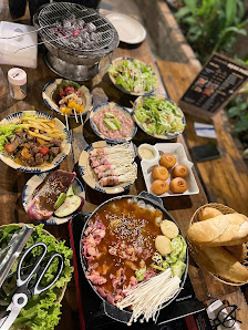 Ảnh chờ bản quyền — Tiệm Lẩu Nướng Hạnh Phúc
